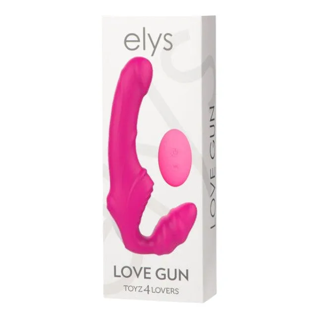 Vibrator dublu TOYZ4LOVERS Elys Love Gun. strap-on fără ham. control prin telecomandă. cu vibrații multiple. 21.8 cm. roz
